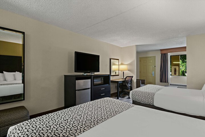 1 King Bed Junior Suite Microwave and Refrigerator WiFi Shower Only Continental Breakfast (12 of 19)