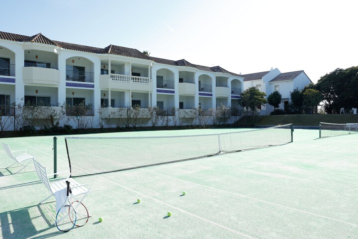 Tennis and Basketball Courts 30 of 58