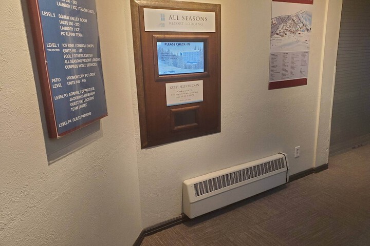 Check-in/check-out kiosk