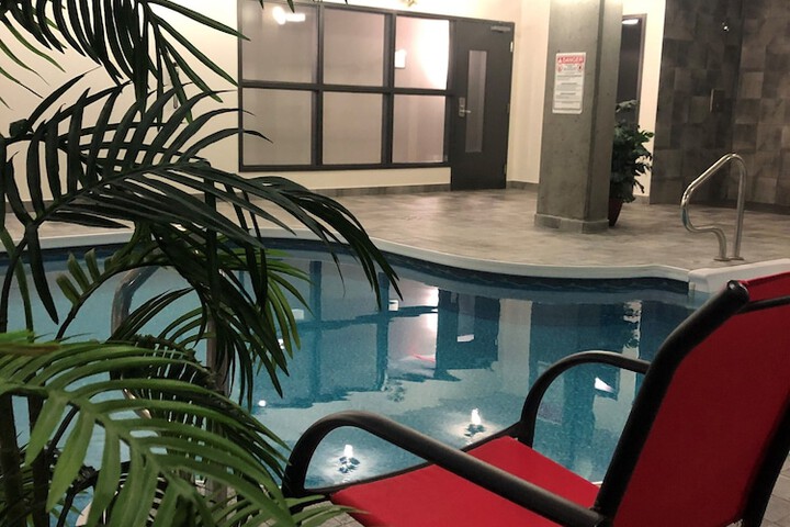 Swimming pool at Grand Times Hotel Quebec City Airport