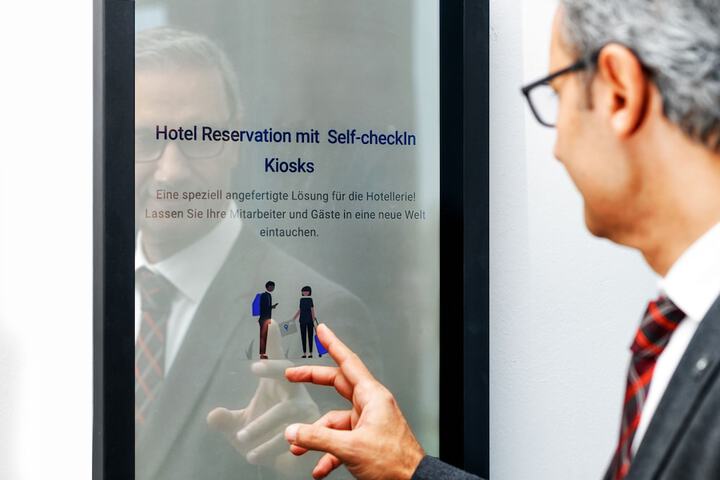 Check-in/check-out kiosk