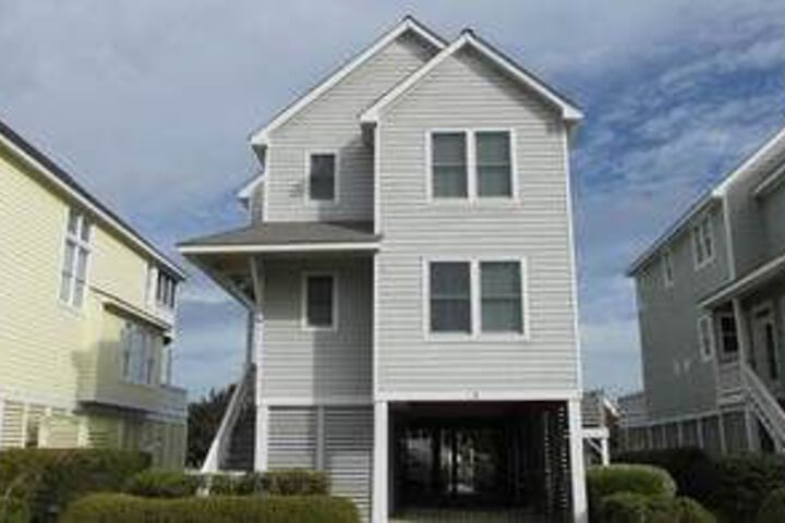 Exterior of Rudder Village 5 4 Br home by RedAwning