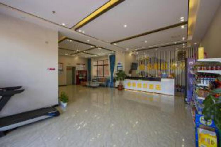 eHome Holiday Hotel (Xunwu New Bus Station Branch)
