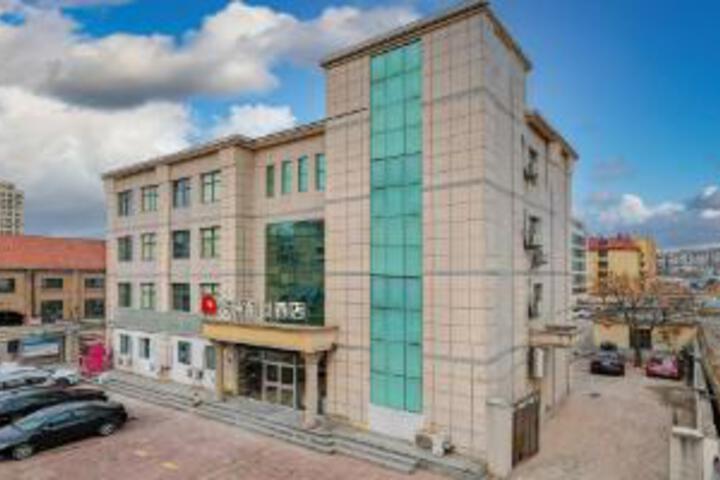 Junyi chain hotel (Qingdao Dongjiakou gangpoli bus station store)