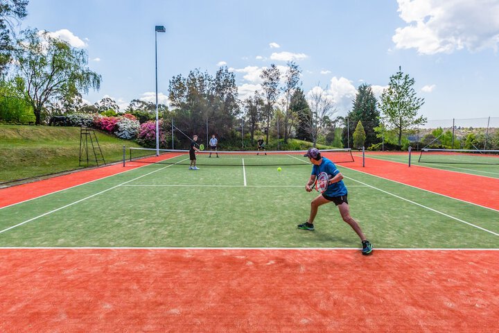 Tennis and Basketball Courts 128 of 210