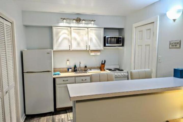 Renovated Oceanfront Building Boardwalk Pool Beach 4 People cozy studio unit walk right out no elevator Kitchen Restaurant in Virginia Beach, VA