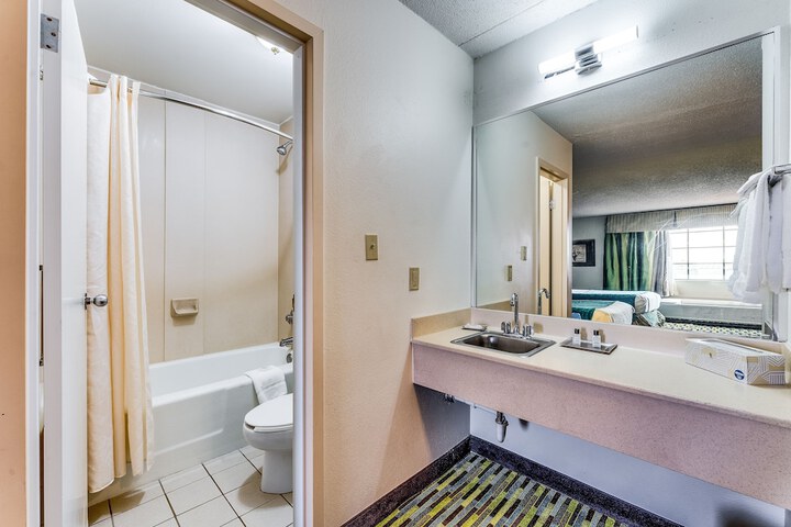 1 King Bed Mobility Accessible Roll in Shower (7 of 17)