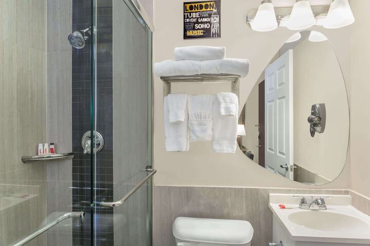 1 King Bed Mobility Accessible Roll in Shower (5 of 15)
