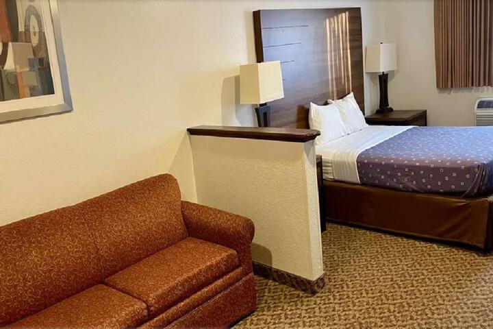 Suite 1 Queen Bed Sofa Bed Microwave and Refrigerator WiFi Continental Breakfast (1 of 2)