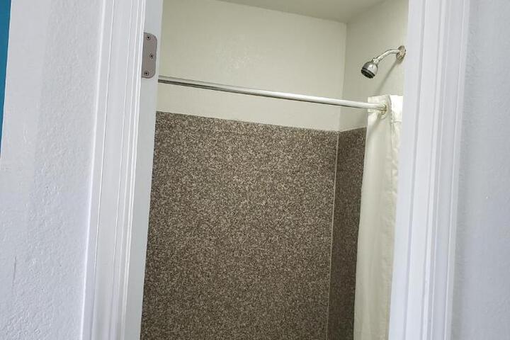 Deluxe Room 1 Queen Bed Refrigerator, Microwave (2 of 6)