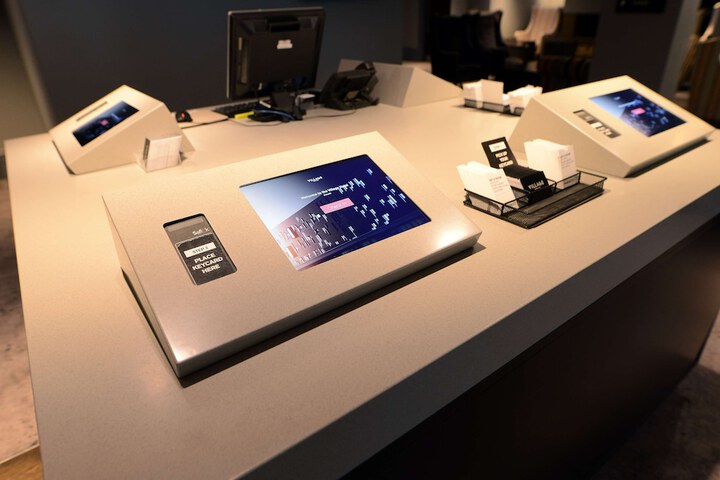 Check-in/check-out kiosk
