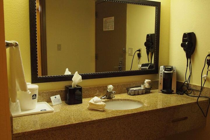 Accessible Suite 1 King Bed Accessible Bathtub Living Area Micro Refriger Continental Breakfast (4 of 5)