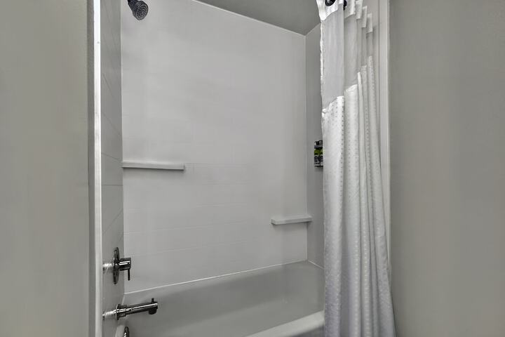 1 King Bed Suite Mobility Accessible Roll Shower (1 of 11)