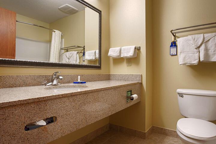 1 King Bed 32 Inch Flat Television High Speed Internet Accessible Microwave and Refrigerator, Coffee Maker, Hairdryer Continental Breakfast (1 of 4)