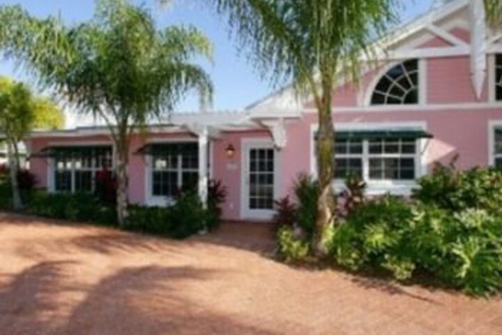 Exterior of Palm Isle 3203 by RedAwning