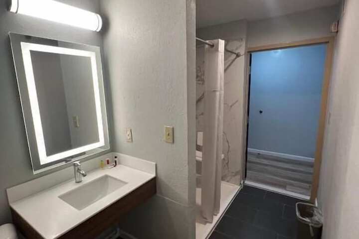 1 King Bed Mobility Accessible Roll in Shower (2 of 6)