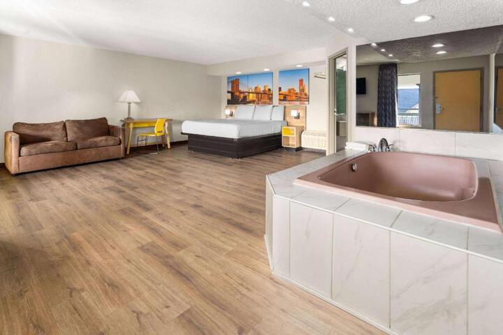 1 King Bed Mobility Accessible Bathtub with Grab Bars (5 of 34)