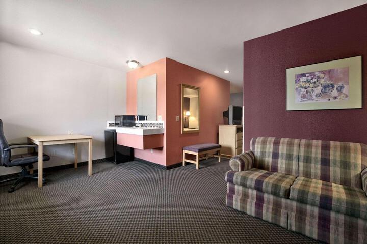 Suite 1 King Bed Jetted Tub Sofa Microwave and Refrigerator WiFi Continental Breakfast (2 of 10)