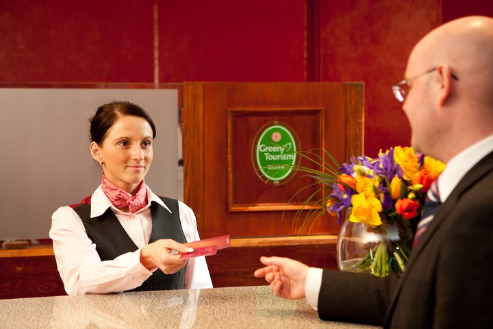 Check-in/check-out kiosk