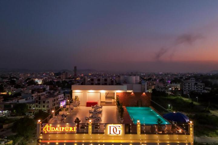 Hotel De Glance - Udaipuri Restaurant I Terrace Swimming pool I Banquet