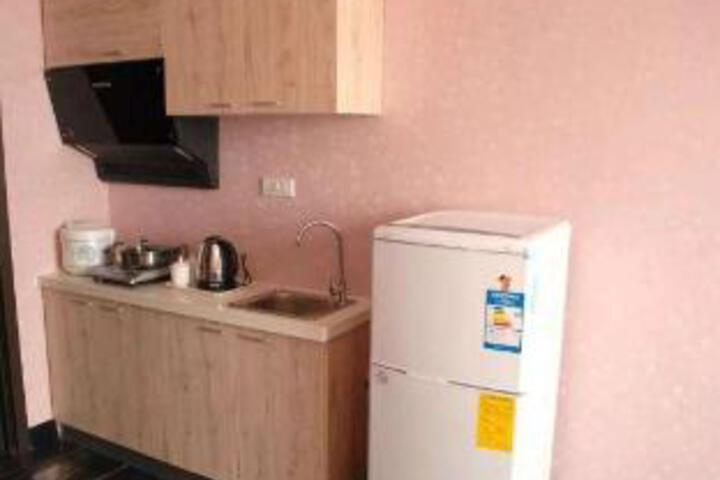 Langman Xiaowu Apartment Hotel