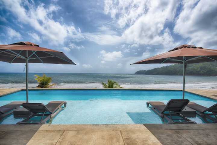 Exterior of Pagua Bay House Oceanfront Cabanas