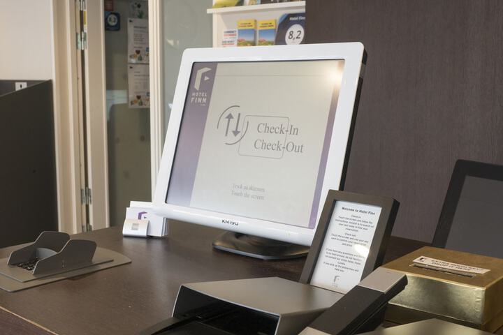Check-in/check-out kiosk