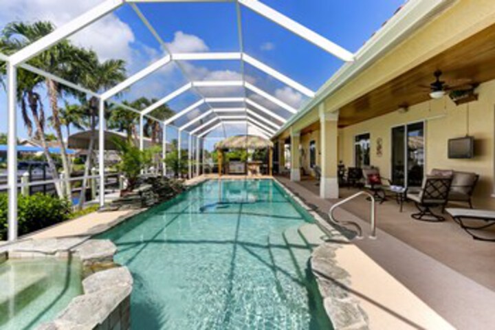 Exterior of Wow Boat Dock, Pool, Spa, Waterfall & Tikki Bar