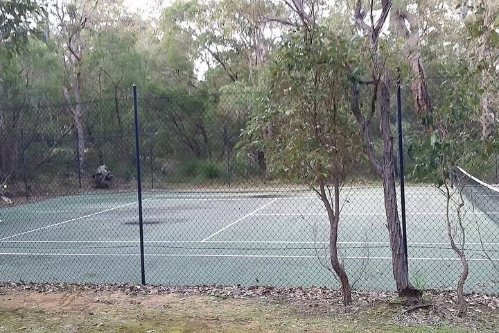 Tennis and Basketball Courts 28 of 36