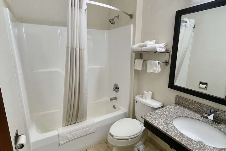 1 King Bed Microwave and Refrigerator WiFi Continental Breakfast (1 of 4)