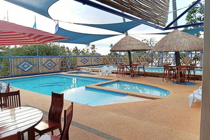 Photo of Rainbow Bay Beach and Dive Resort