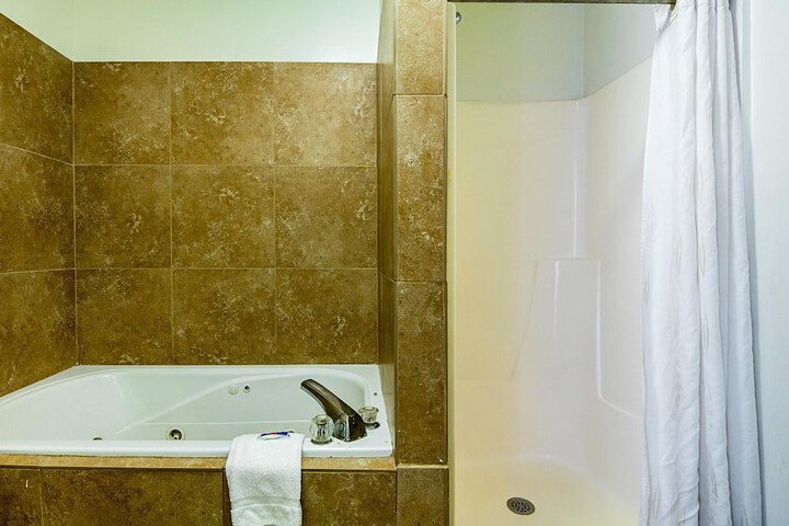1 King Bed | Mobility Accessible Tub Micfridge (13 of 16)