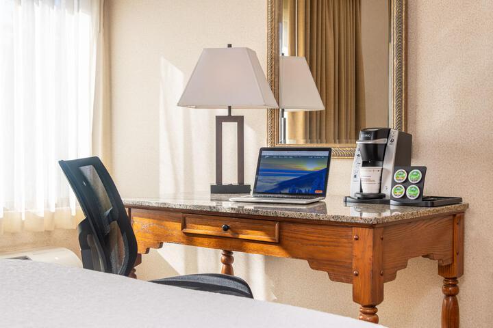 Pet Friendly 2 Double Bed Room This Room Has 2 Double Beds with A Pillow Top Large Desk with Charging Ports and Chair For Working Accessible There Is A Flat Screen TV and Refrigerator The Bathroom Has A Full Shower Tub Combination Hairdryer and Standard Amenities The Room Has A Keurig Coffee Maker Iron and Ironing Board (1 of 6)