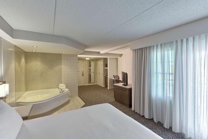 1 King Hearing Accessible Roll in Shower with Balcony (9 of 13)