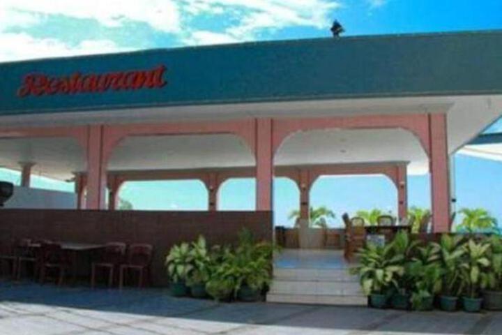Exterior of RedDoorz Plus at Hotel Pantai Timor