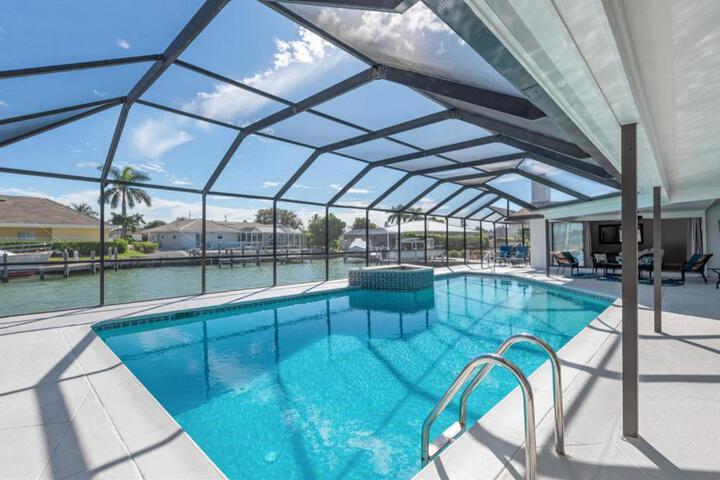 ELEVATED 955 - Spacious Family Riverfront home 4 Bedrooms in Marco Island, FL