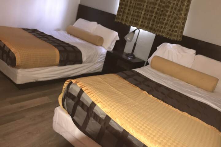 2 Room Suite with Kitchenette | 1 King and 1 Double Bed (1 of 5)