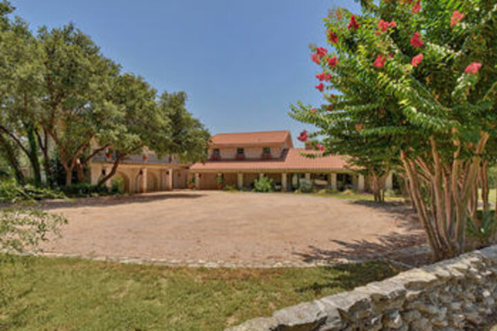 Exterior of 7BR 5 5BA Spicewood Sanctuary by RedAwning