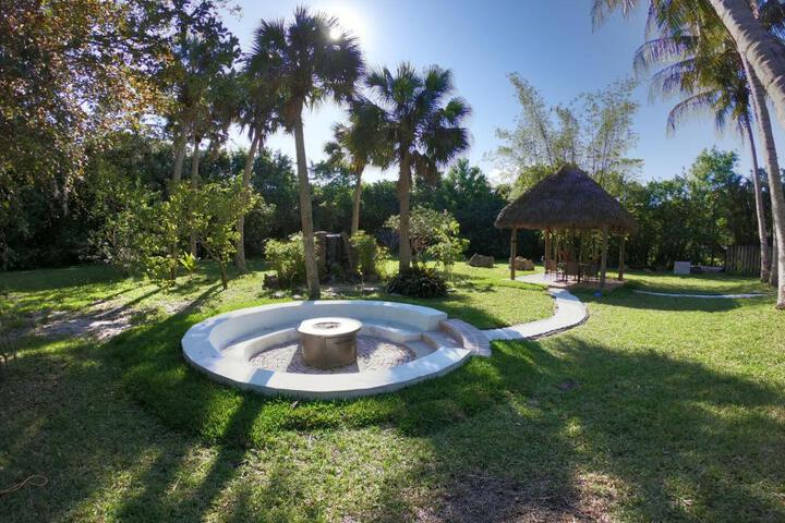 Photo of JUPITER WATERFALLS - NEWLY UPDATED - TIKI HUT FIRE PIT, KITCHEN, POOL HEATER and MORE