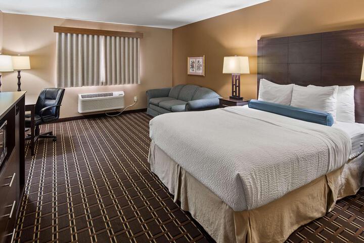 1 King Bed Larger Room Sofa Bed Microwave and Refrigerator WiFi Continental Breakfast (11 of 12)
