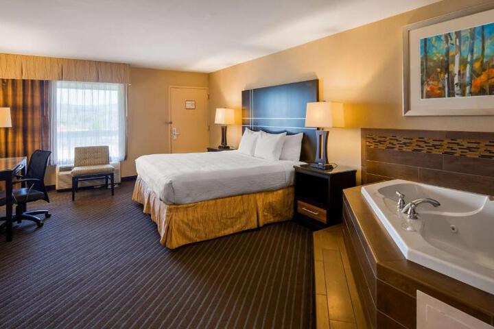 1 King Bed Microwave and Refrigerator Flat Screen Television High Speed Internet Accessible (12 of 15)