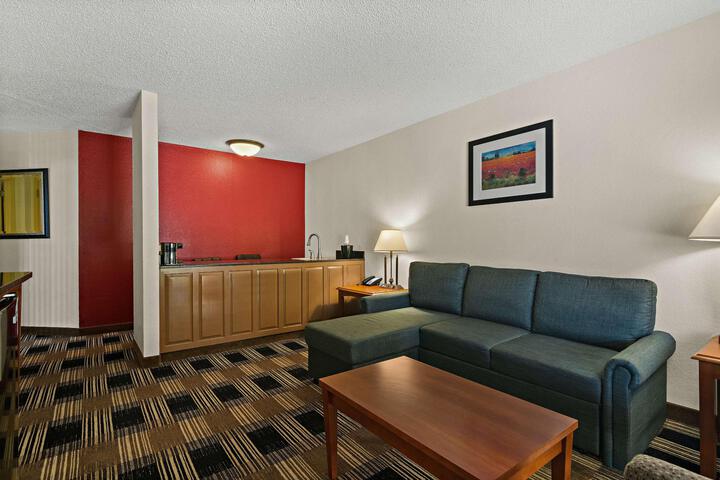 1 King Bed Junior Suite Microwave and Refrigerator WiFi Shower Only Continental Breakfast (9 of 19)
