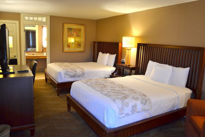 Deluxe Room 2 Queen Beds Refrigerator, Microwave Courtyard Area (1 of 18)