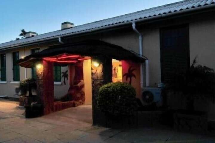 Front of property - evening/night