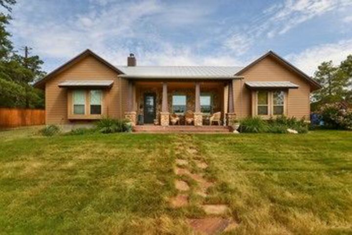 Exterior of 3BR 3BA Lake Travis Retreat with Pool Oasis by RedAwning