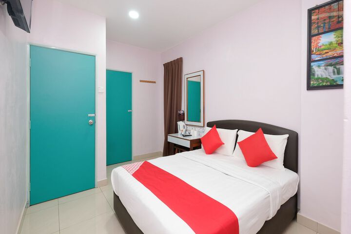 Photo of OYO 89877 Sun Triang Hotel