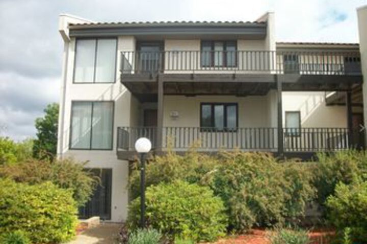 Exterior of Four Seasons Racquet Club Condominiums