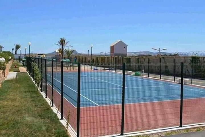 Tennis and Basketball Courts 35 of 52