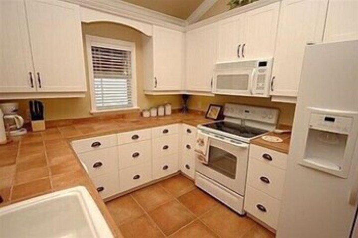 Exterior of Palm Isle 3209 by RedAwning