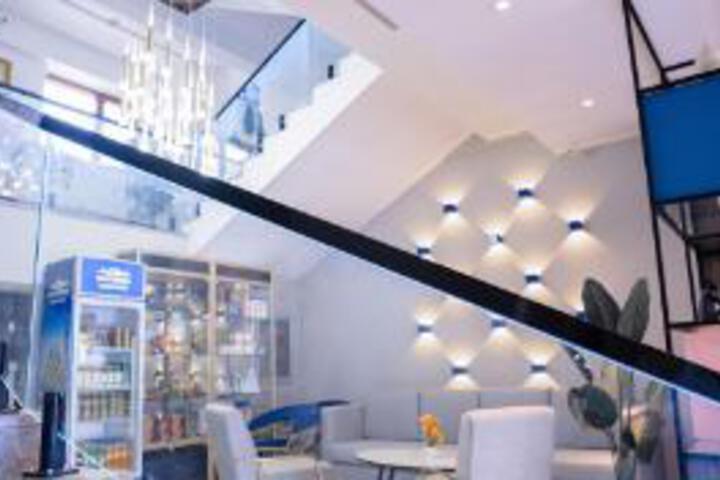 7 Days Inn (Shenyang Xinmin Liaohe Street Station Front Branch)
